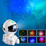 🚀 Lámpara Astronauta Proyector Galáctico LED – 7 Colores + Control Remoto